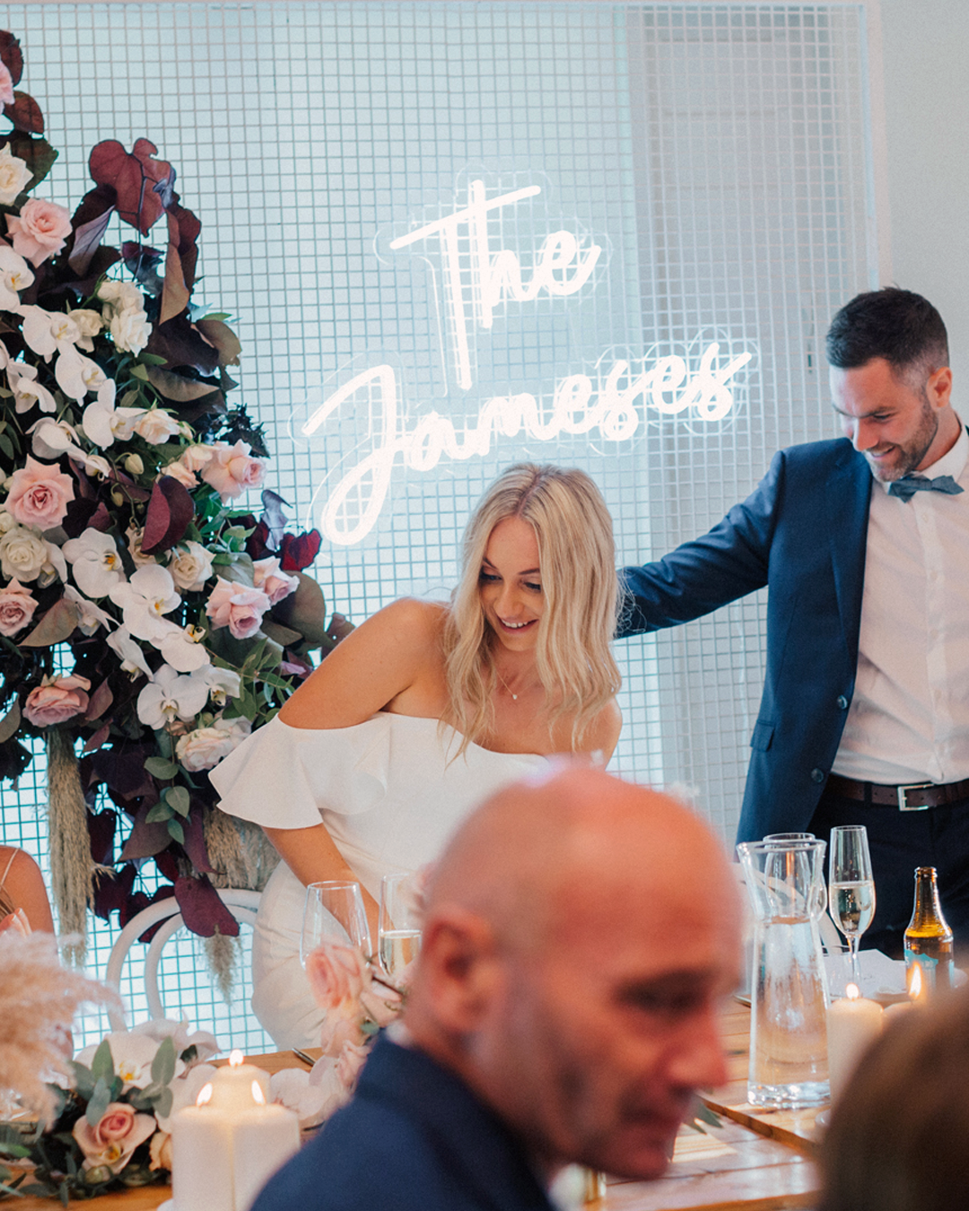personalized neon sign saying ‘The Jameses’