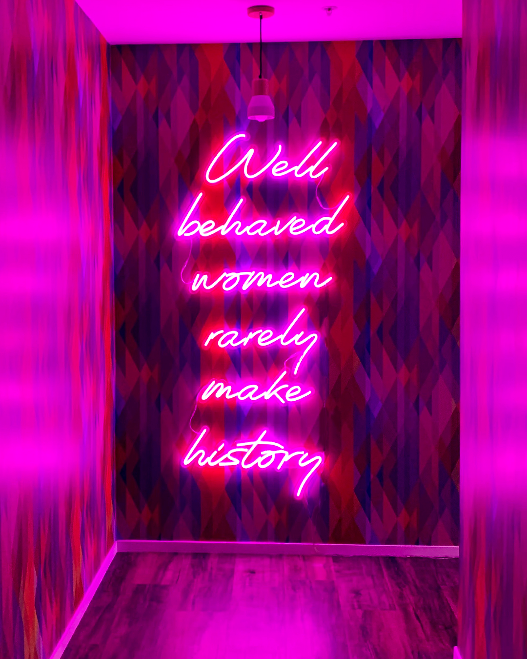  personalized neon sign saying ‘well behaved women rarely make history’